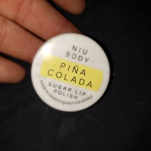 Nui body pina colada sugar lip polish